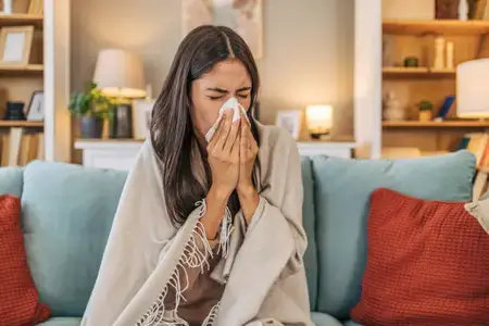 young-woman-is-feeling-sick-with-a-common-monsoon-illness-a-cold.